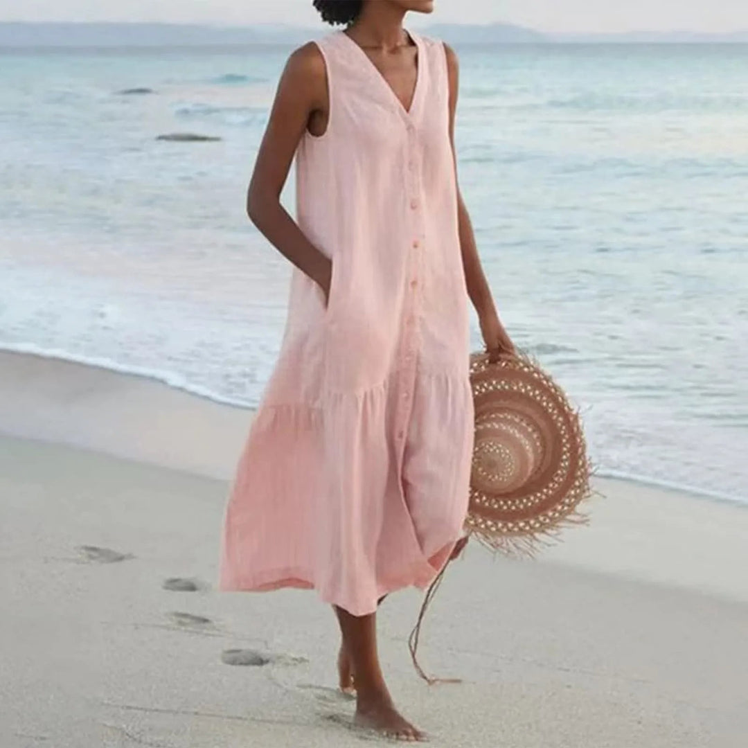 Versatile women's midi summer dress, V-neck, sleeveless, button-front, with practical pockets.