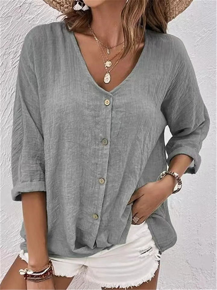 Effortless women's button-front V-neck shirt, a comfortable relaxed fit top for daily style.