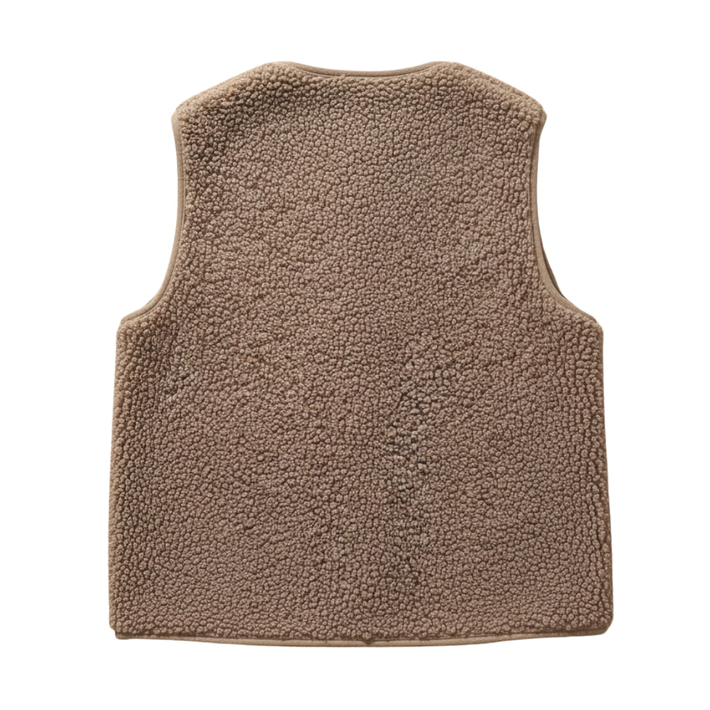 Side view of a comfortable women's sherpa vest, versatile for layering