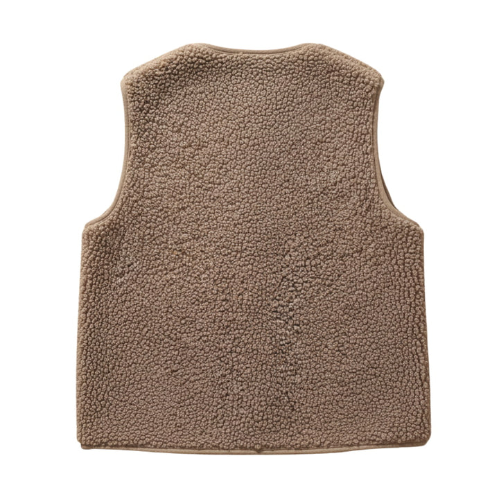 Side view of a comfortable women's sherpa vest, versatile for layering