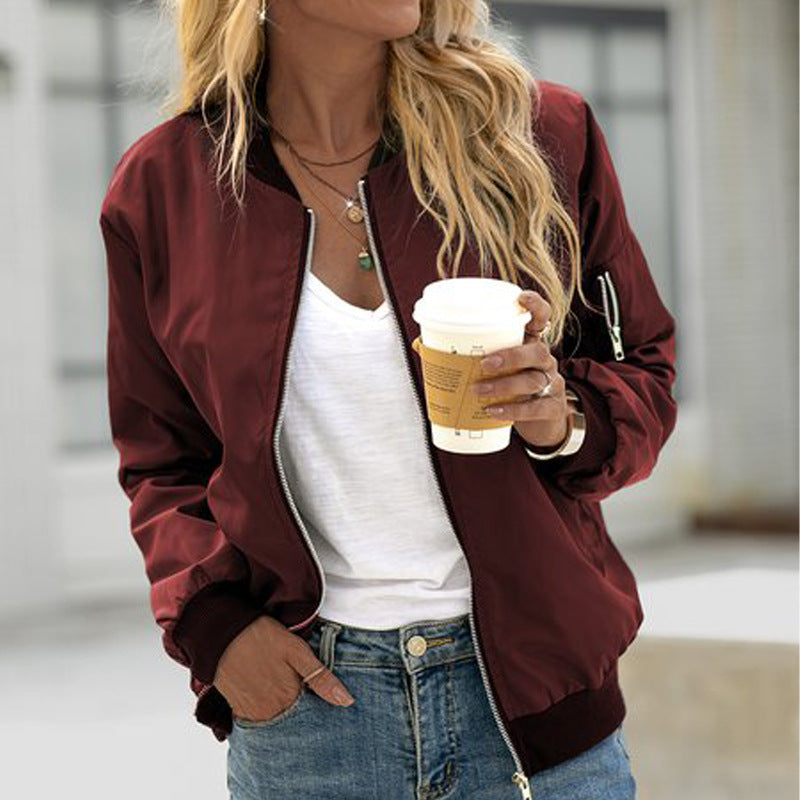 Fashionable women's bomber jacket with a front zipper, a versatile and lightweight casual jacket.