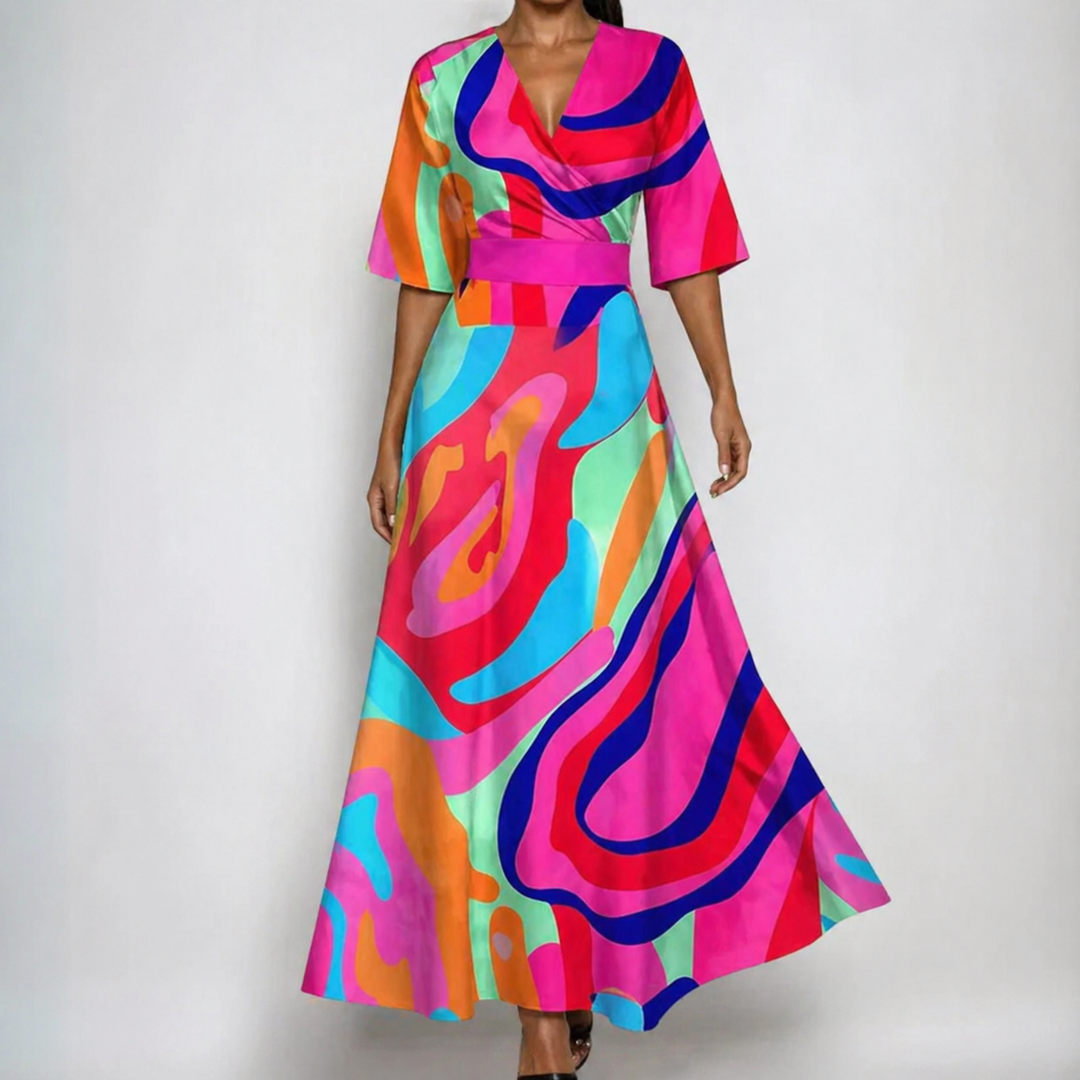Celeste floral wrap V-neck maxi dress for women, featuring a flattering belted waist. Chic party or wedding guest dress.