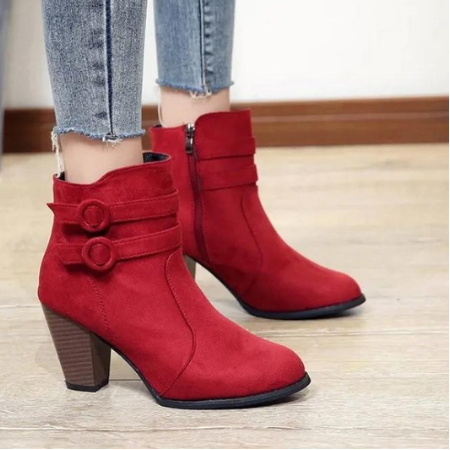 Fashionable women's zip-up ankle boots with a comfortable block heel and decorative side buckle.