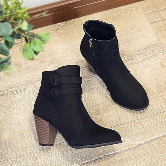Chic women's winter ankle boots with a practical zipper and eye-catching buckle, ideal for any outfit.