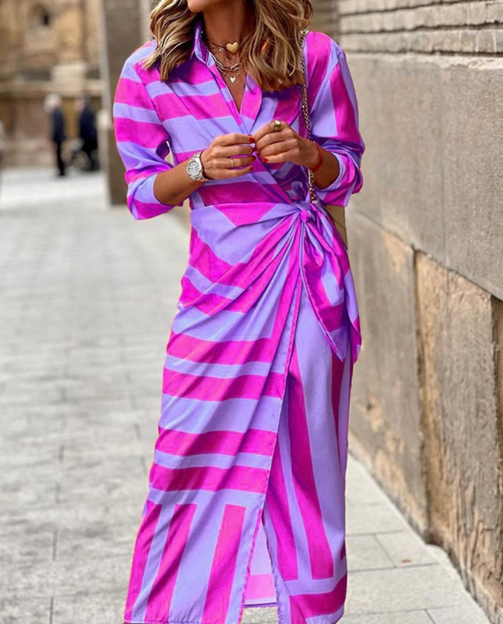 Patterned women's wrap dress, a chic midi style with a collared design for modern elegance.