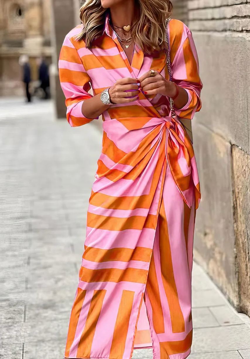 Vibrant printed midi wrap dress for women, ideal for chic summer outings and casual elegance.