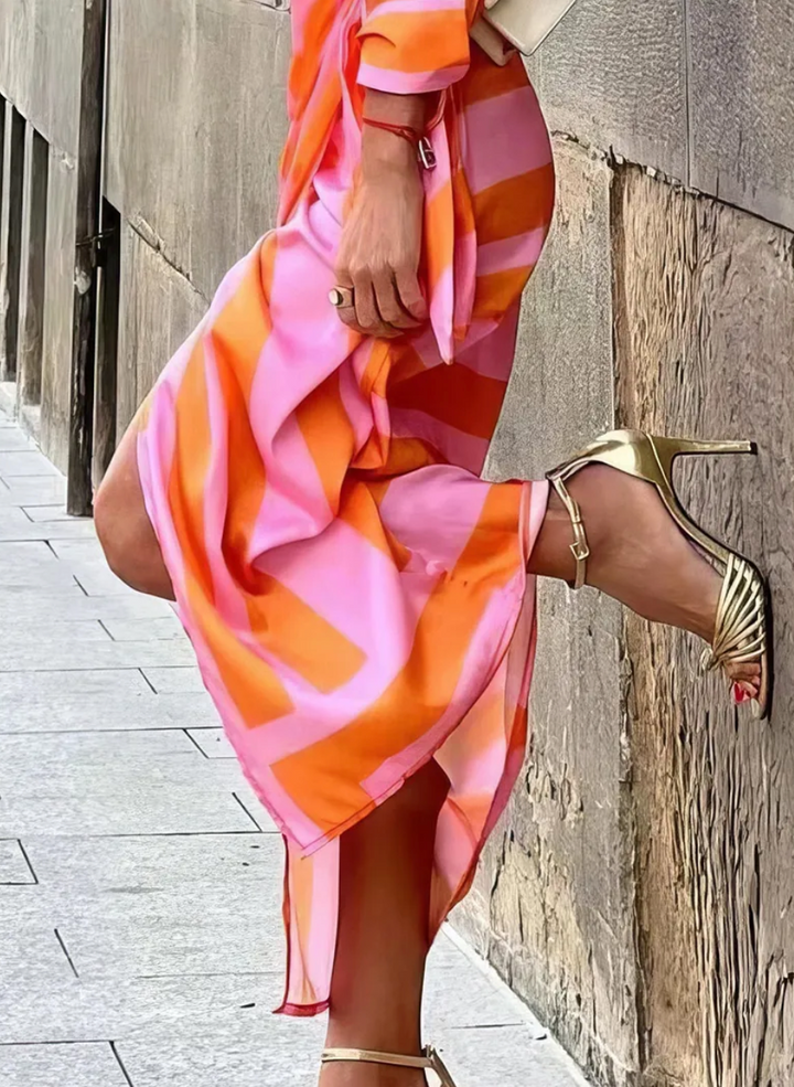 Stylish women's printed wrap midi dress, featuring a comfortable fit and versatile design.