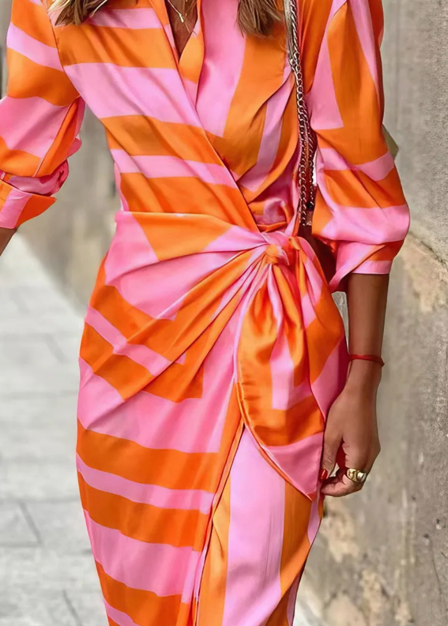 Collared midi wrap dress for women, featuring a unique print & versatile style for day or evening.