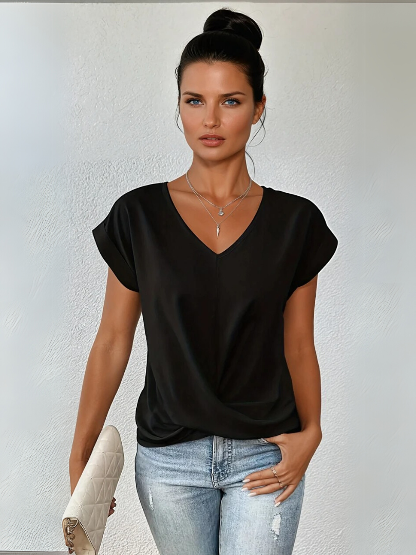 Women's chic twist-front V-neck short sleeve top. Elegant, versatile blouse for a polished look.
