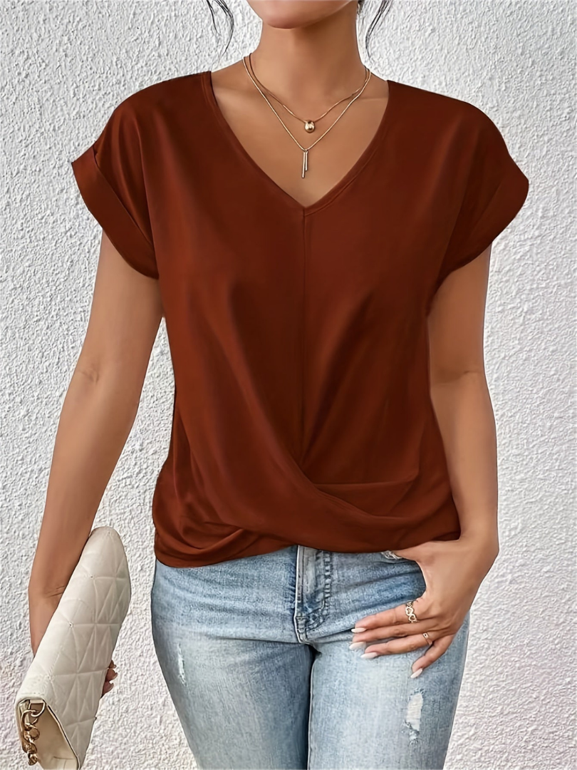 Chic women's blouse: short sleeve, V-neck, and modern twist-front. Achieve an elegant & sophisticated look.