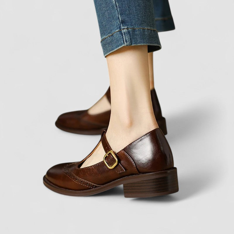 Detail of the durable sole and low heel on women's classic black mary jane flats