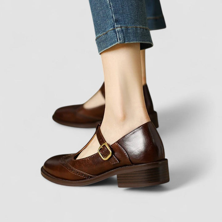 Detail of the durable sole and low heel on women's classic black mary jane flats