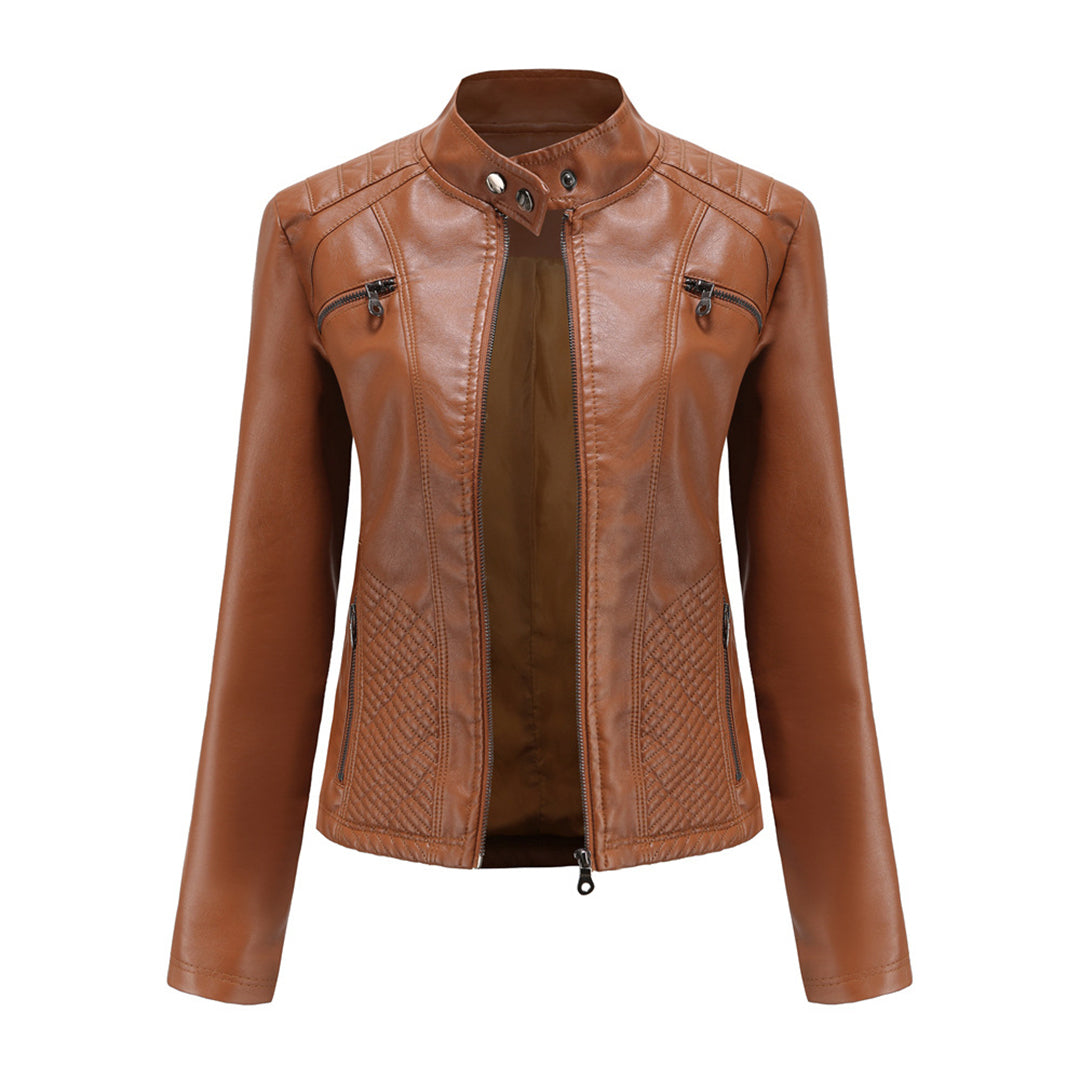 Close-up of a women's faux leather jacket, showing the texture and metal hardware on the zip.