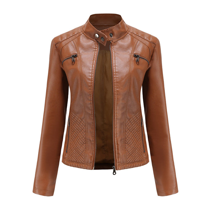 Close-up of a women's faux leather jacket, showing the texture and metal hardware on the zip.