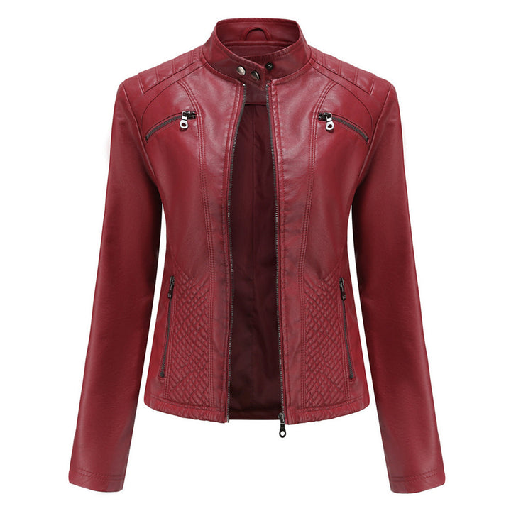 Fashionable women's seasonal biker jacket in faux leather, featuring a front zip and pockets.