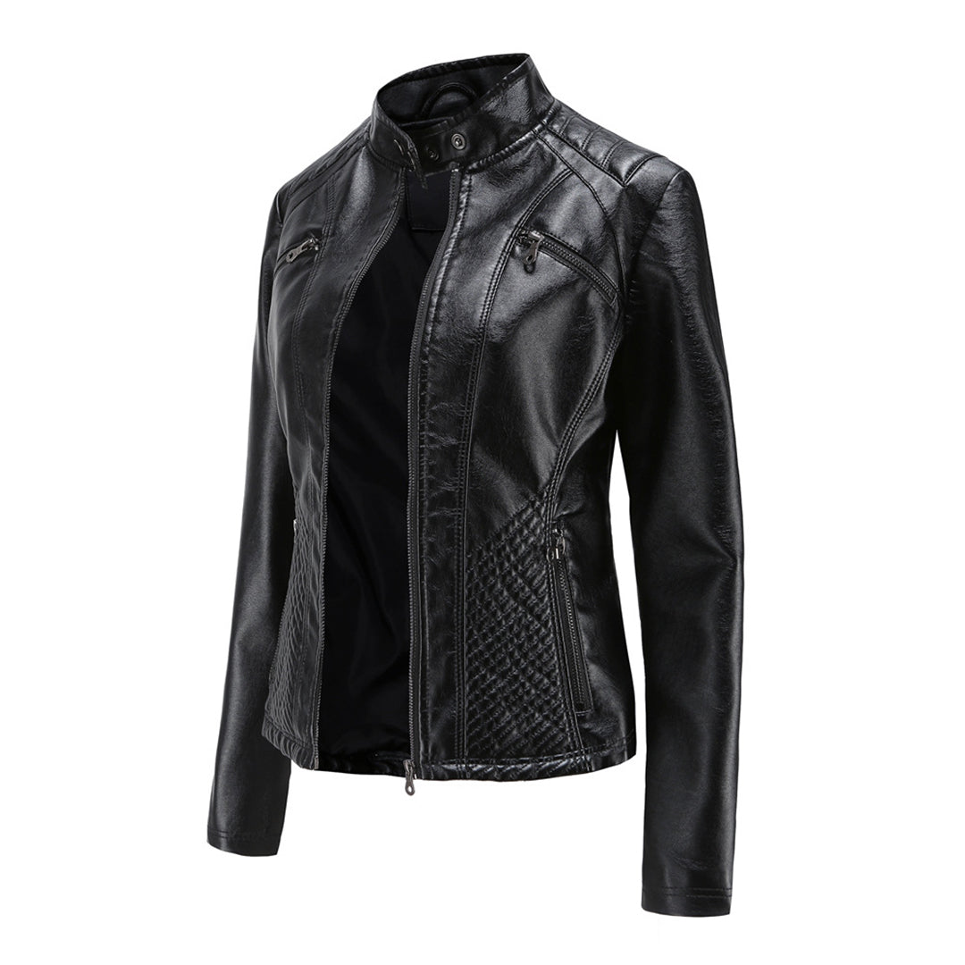 Detailed view of the cuffs and zip closure on a women's classic faux leather biker jacket.