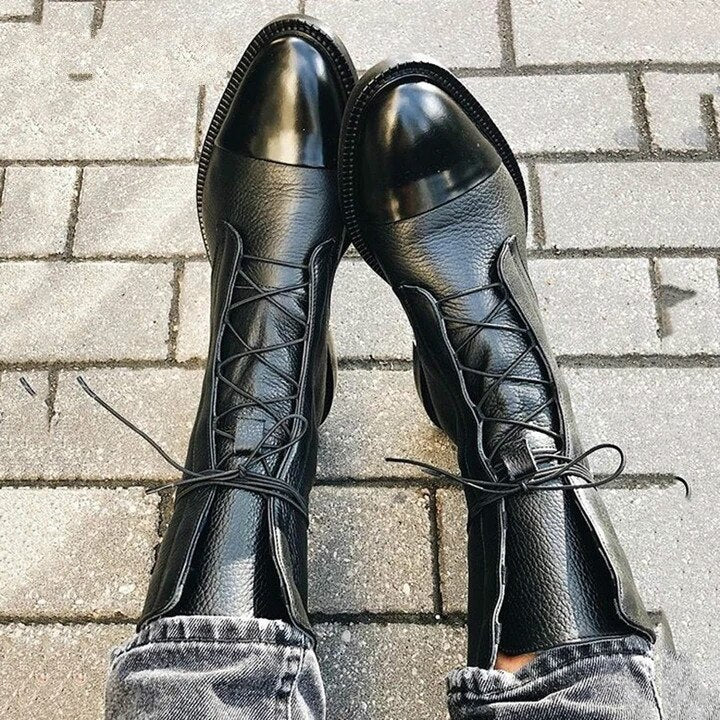 Women's classic black lace-up ankle boots, durable for fall & winter, styled for everyday wear.