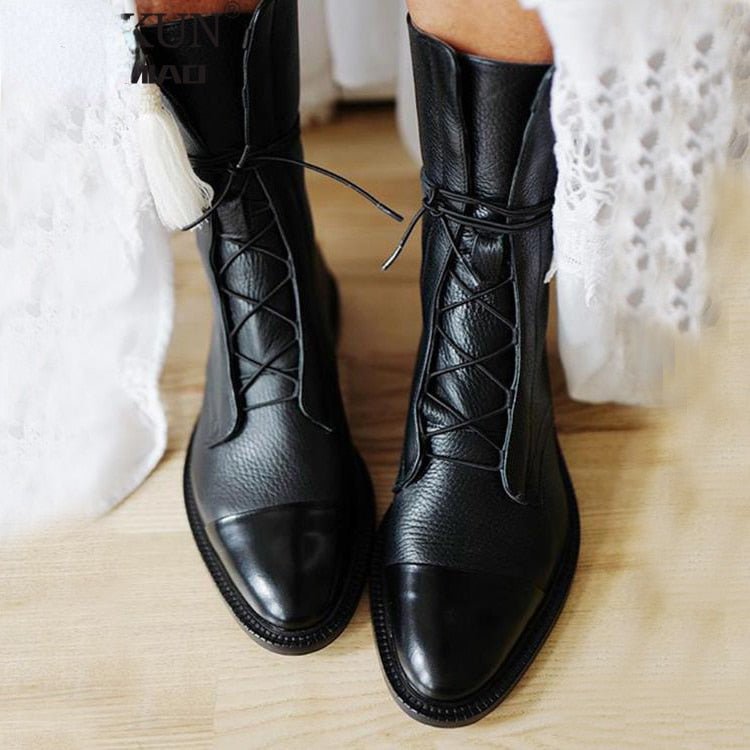 Classic black lace-up ankle boots for women, perfect for fall fashion, durable and stylish.
