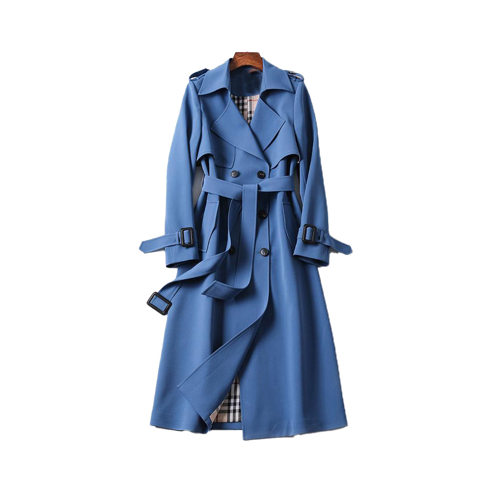 Stylish women's classic trench coat, belted at the waist, suitable as a winter jacket.