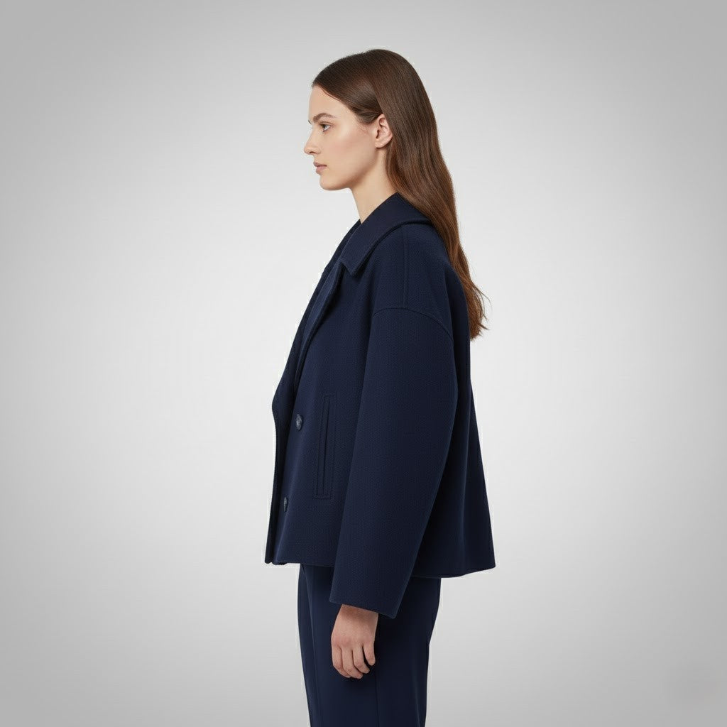 Women's short jacket with a fashionable double-button closure, a must-have for classic elegance.