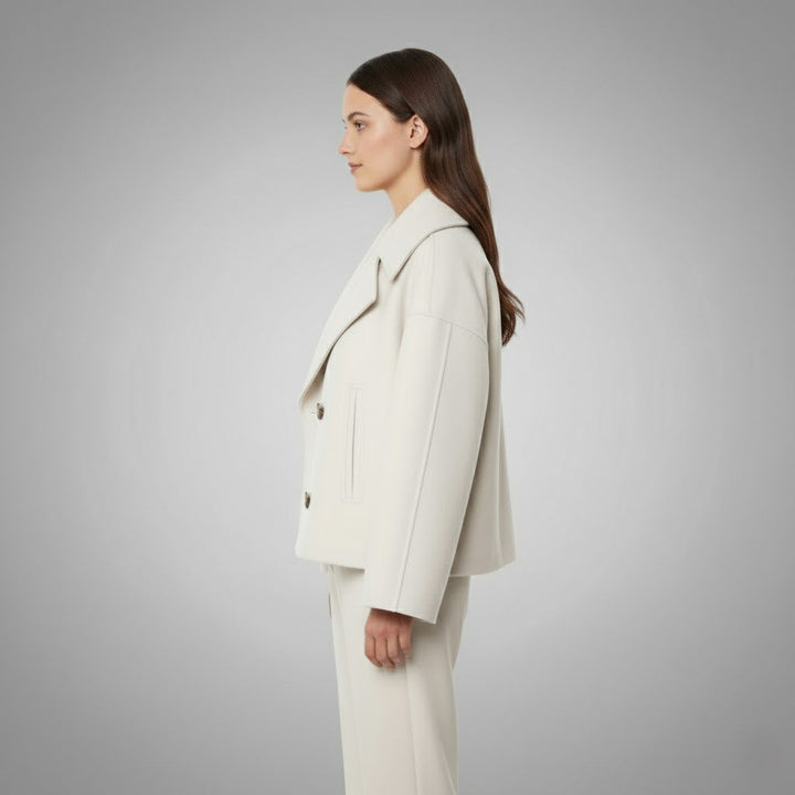 Elegant women's short jacket featuring a timeless double-button design, ideal for versatile wear.