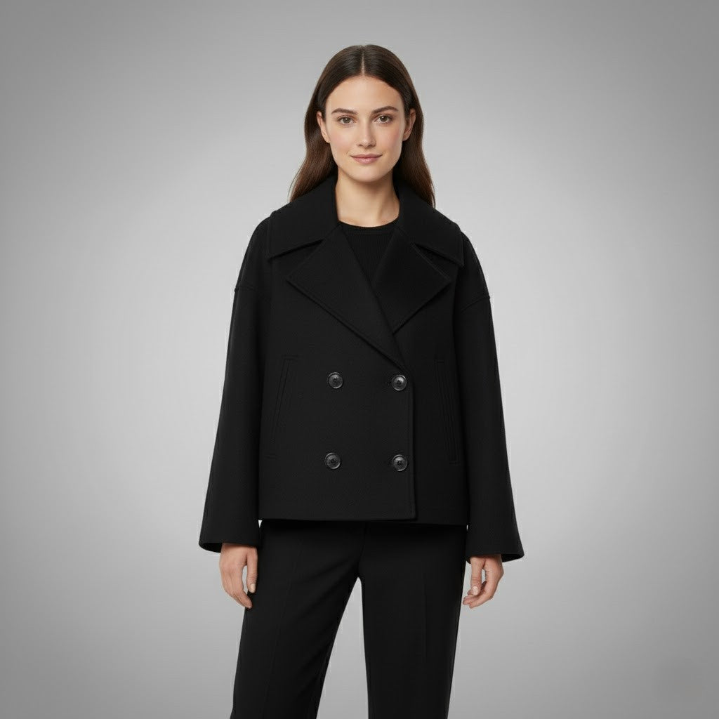 Classic women's outerwear: a cropped jacket with a stylish double-button closure.