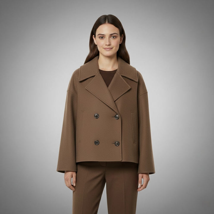 A stylish women's double-button short jacket, an essential piece of classic outerwear.