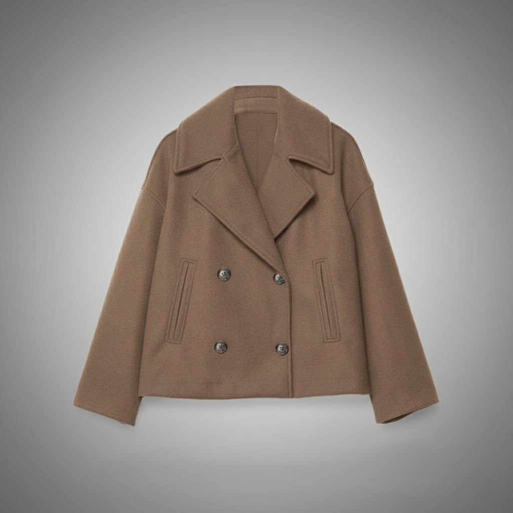 Elegant cropped jacket for women, featuring a sophisticated double-button detail.