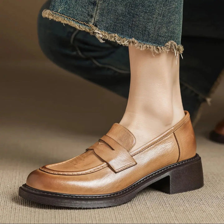 Versatile light brown leather T-strap flats, women's classic and comfortable dress shoes for enduring style.