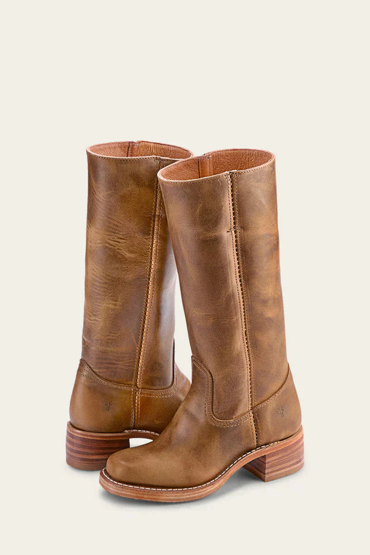 Side profile of women's fashion-forward mid-calf western boots, showcasing the elegant shaft and Cuban heel design