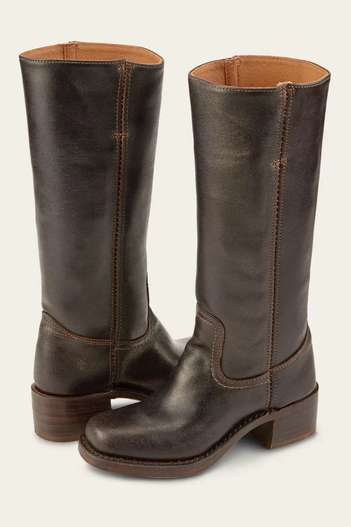 Detail shot of the stacked wooden heel and arch support in women's premium mid-calf western boots