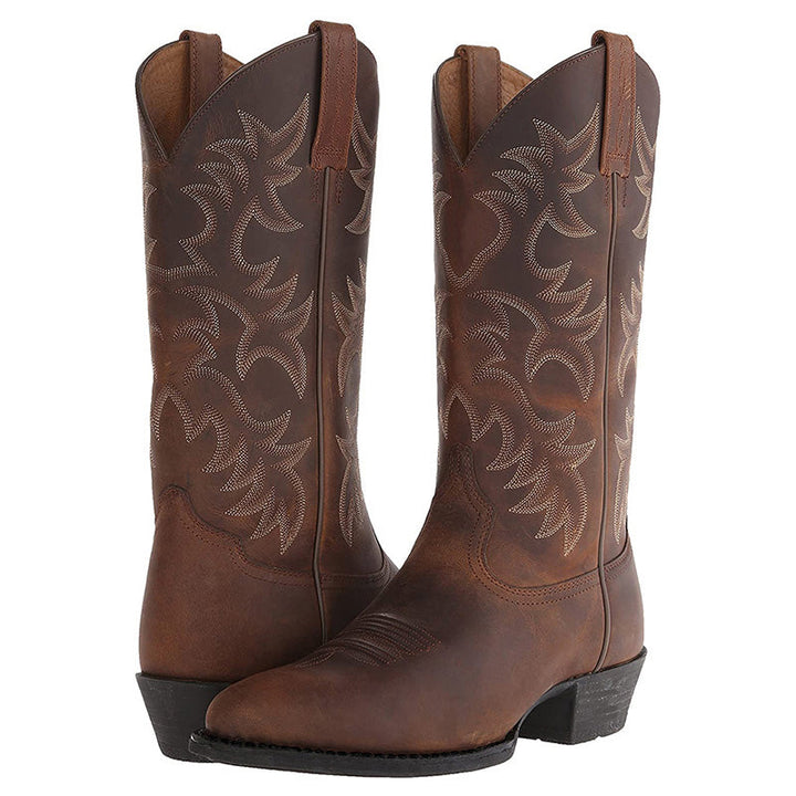 Women's classic Western boots with elegant floral embroidery, perfect for a country style outfit.