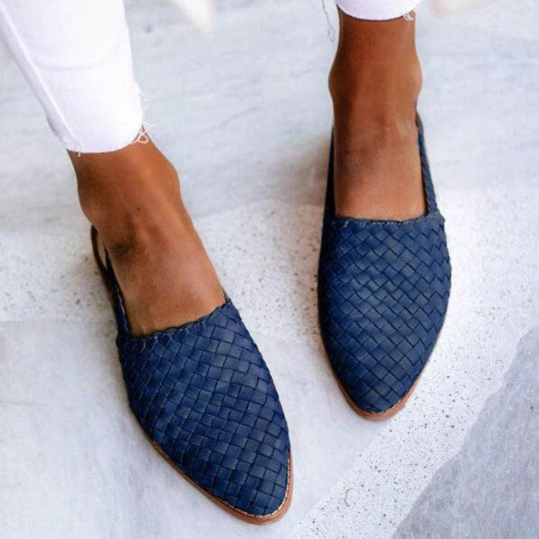 Elegant women's woven closed-toe mule loafers. Easy slip-on style, great for casual outings or dressy comfort.