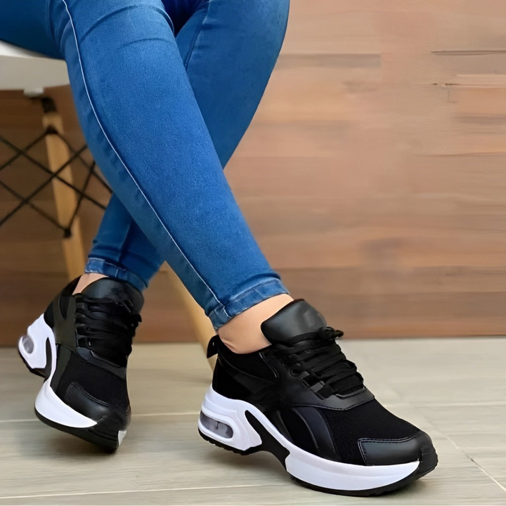 Stylish women's black Cloud-Comfort athletic sneakers, perfect for casual wear and daily walking. Lace-up design.