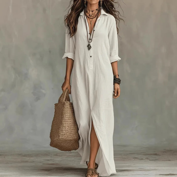 Women's collared button-front maxi dress with a stylish split hem, perfect for casual summer outings.