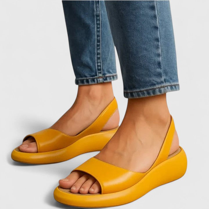 Supportive women's comfort sandals, providing cushioned relief and stylish design for any outfit.