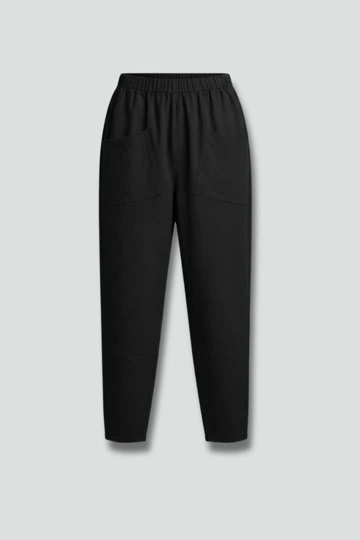 Women's comfortable ankle-length trousers with elastic waist & side pockets, tapered leg.