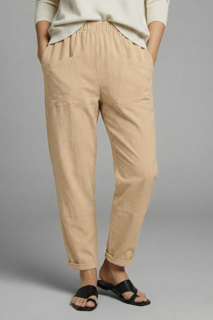 Chic women's casual pants, elastic waist, tapered leg & side pockets, perfect for everyday wear.