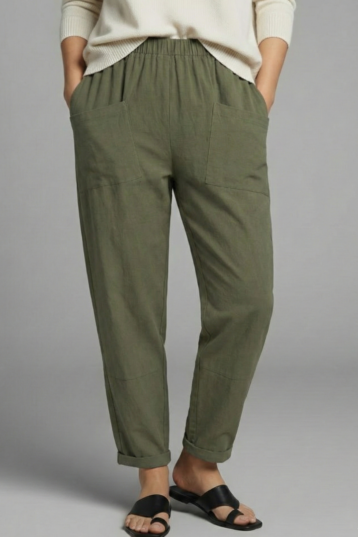 Close-up of elastic waist & drawstring on women's everyday trousers with side pockets.