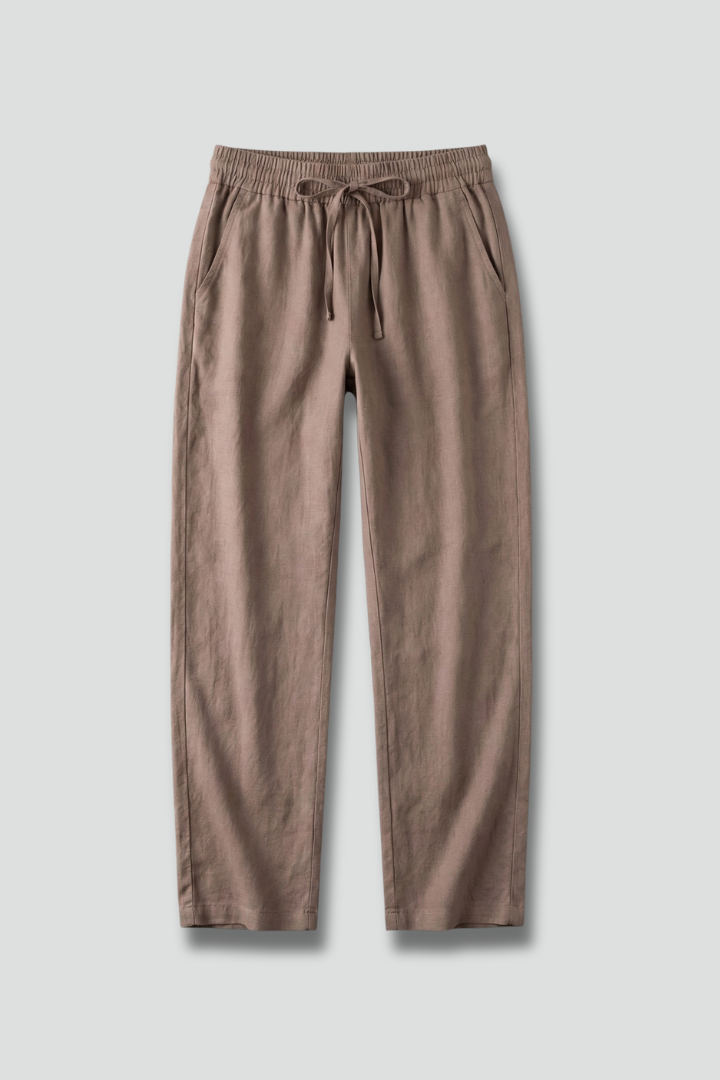 Tapered ankle-length hem detail on chic women's casual pants with elastic waist & side pockets.