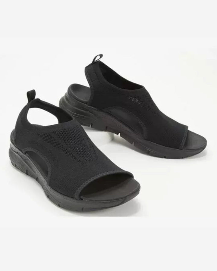 Close-up of a women's open-toe sandal, highlighting its comfortable design and casual style.