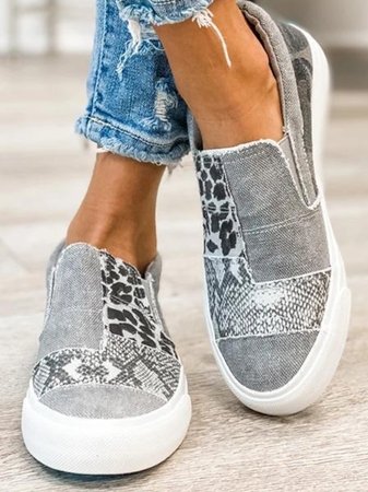 Pair of women's leopard print comfort shoes, slip-on style, ideal for casual wear and easy on/off