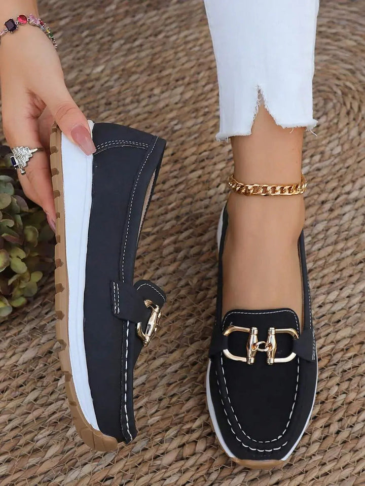 Elegant slip-on orthopedic loafers for women, offering arch support and comfort.