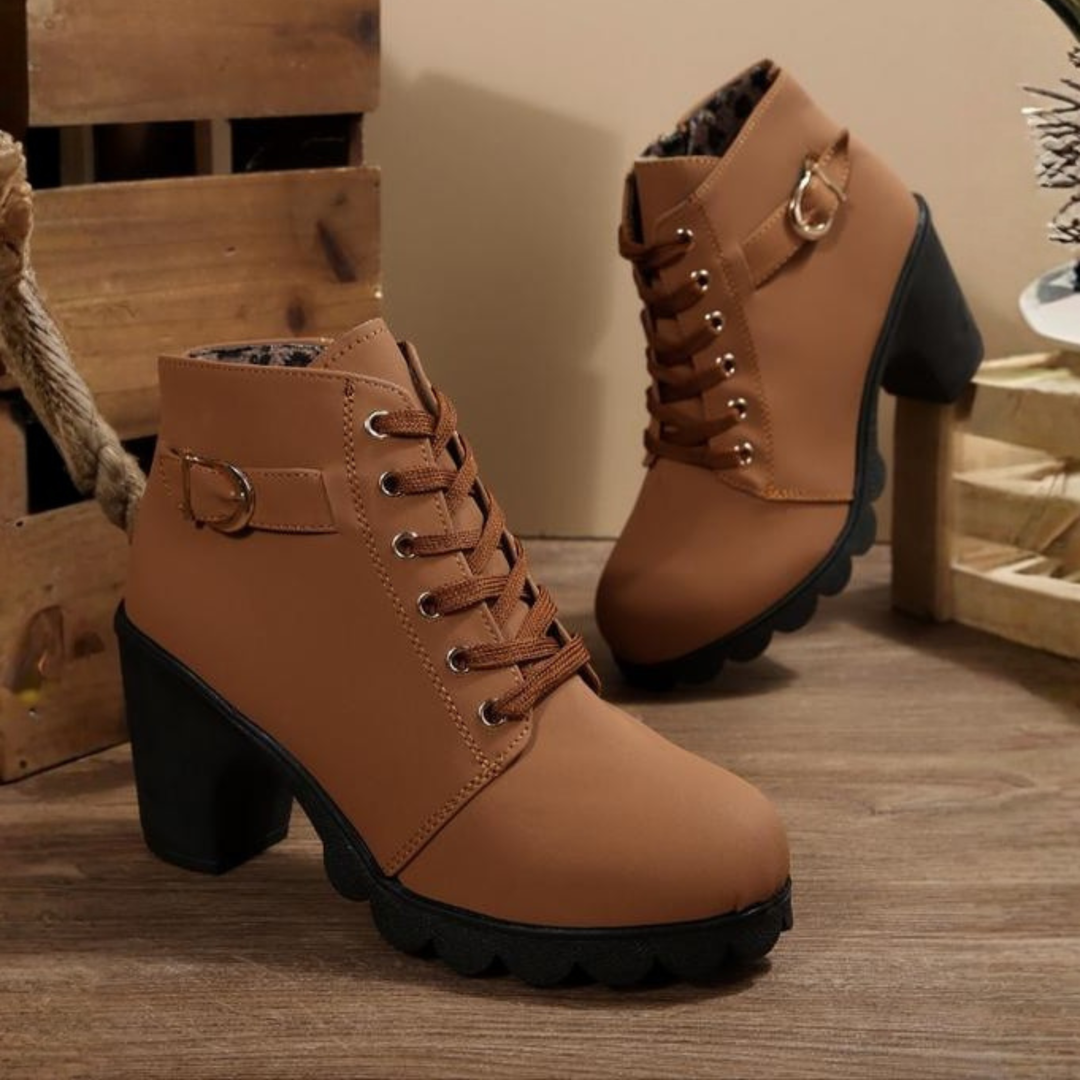 Side view of women's orthopedic ankle boots, featuring arch support, comfortable design, and durable block heel.