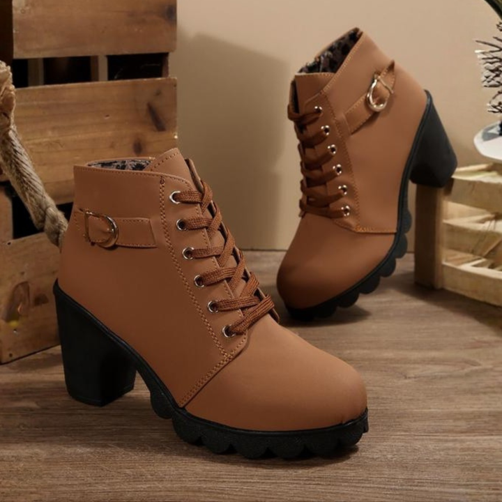 Side view of women's orthopedic ankle boots, featuring arch support, comfortable design, and durable block heel.
