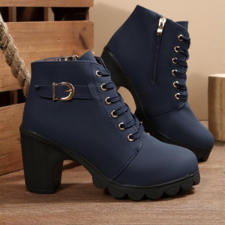 Close-up of women's comfortable winter boots with arch support, showcasing durable material and lace-up closure.