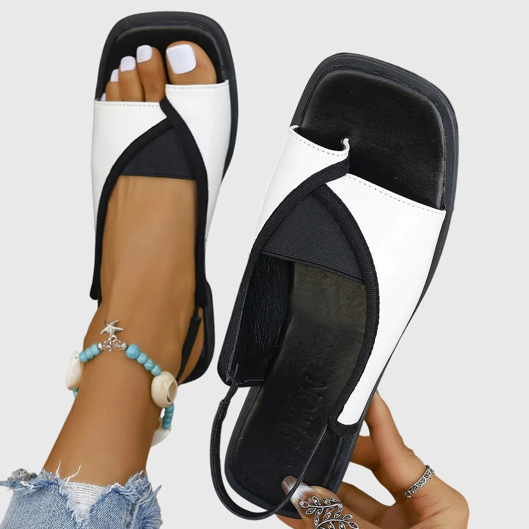 Women's comfortable orthopedic flat sandals for summer. Slip-on casual footwear with arch support, perfect for everyday style.
