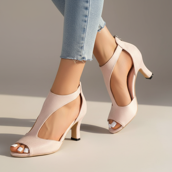 Stylish pink women's orthopedic heels, comfortable for all-day support. Perfect dress or walking shoes.