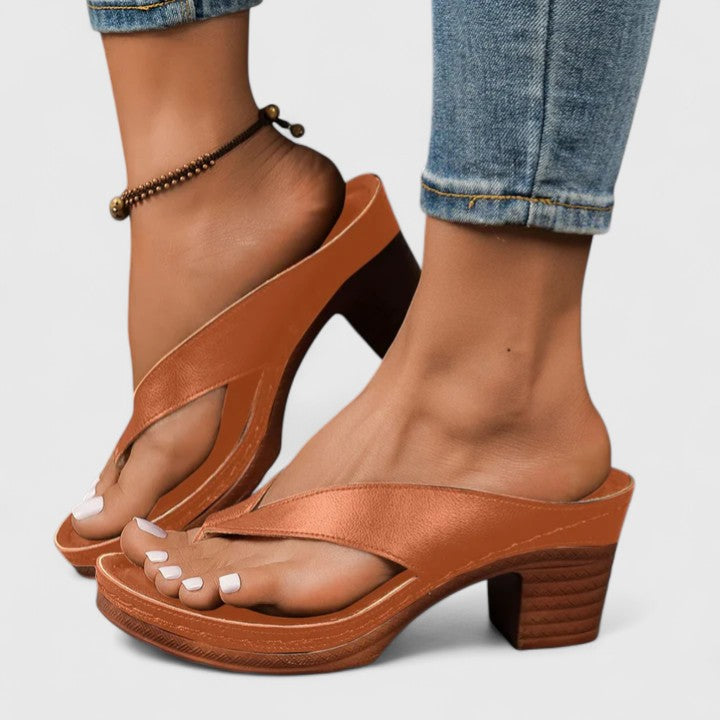 Cushioned orthopedic heels for women with slip-resistant sole, ensuring comfort & safety all day.