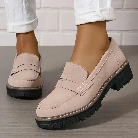 Side view of women's orthopedic slip-on loafers, highlighting arch & cushioned support for comfort footwear.